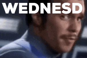 Celebrity gif. Close up of Sam Rockwell, who smiles and leans his head back with the text “WEDNESD” at the top, jerking his head back as if commanding the camera to zoom out. He Celebrity gif. Close up of Sam Rockwell, who smiles and leans his head back with the text “WEDNESD” at the top, jerking his head back as if commanding the camera to zoom out. He